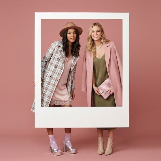 Fashion Editorial with Two Models in Polaroid Frame