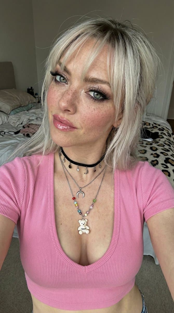 Freckled Woman Selfie with Layered Necklaces