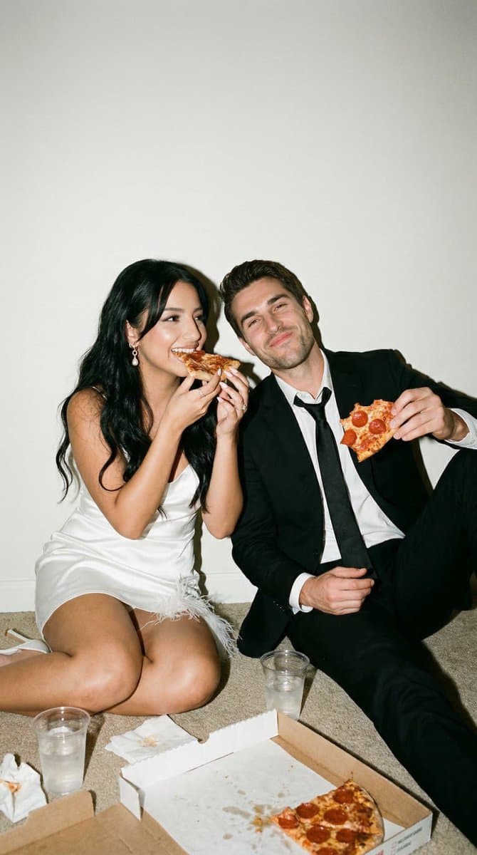 Flash Editorial After-Party Portrait of Couple Eating Pizza